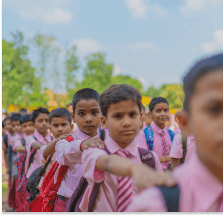 Student standing in school assembly